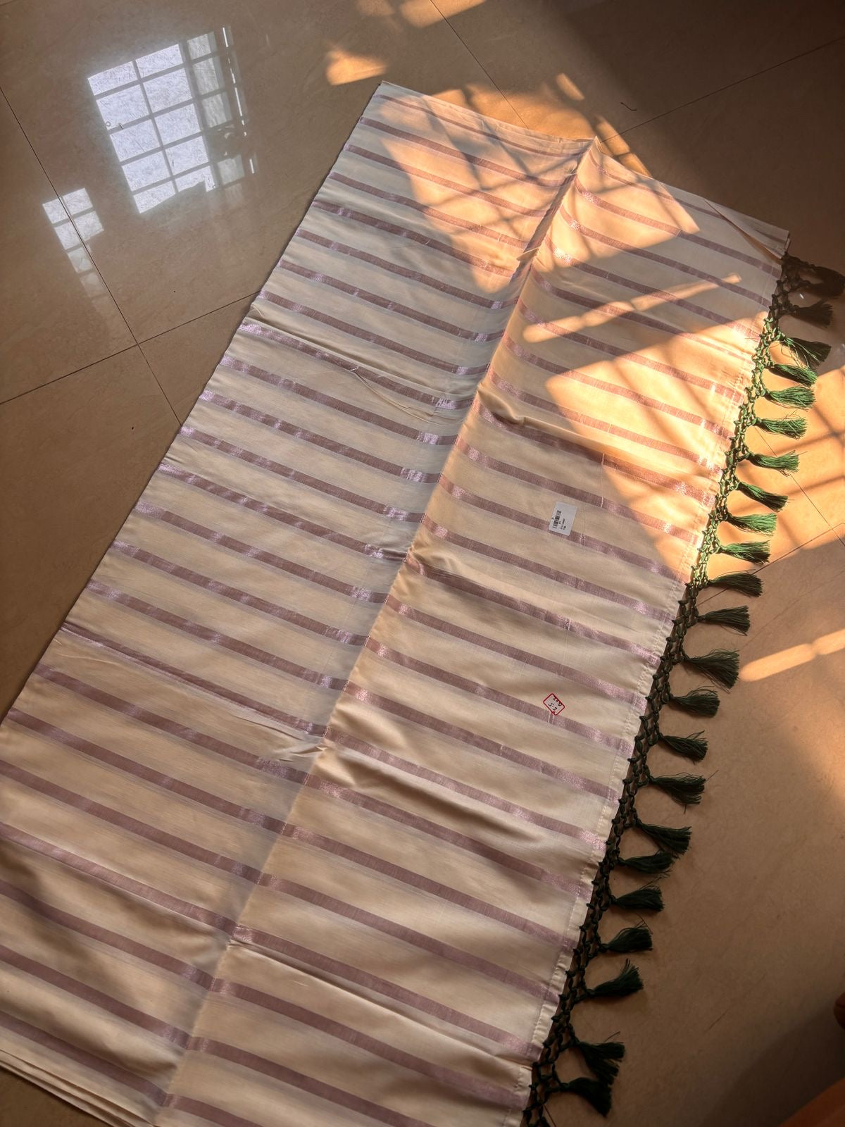 Sarvani Rose gold stripes Kerala Saree with bottle green tassels SAR12