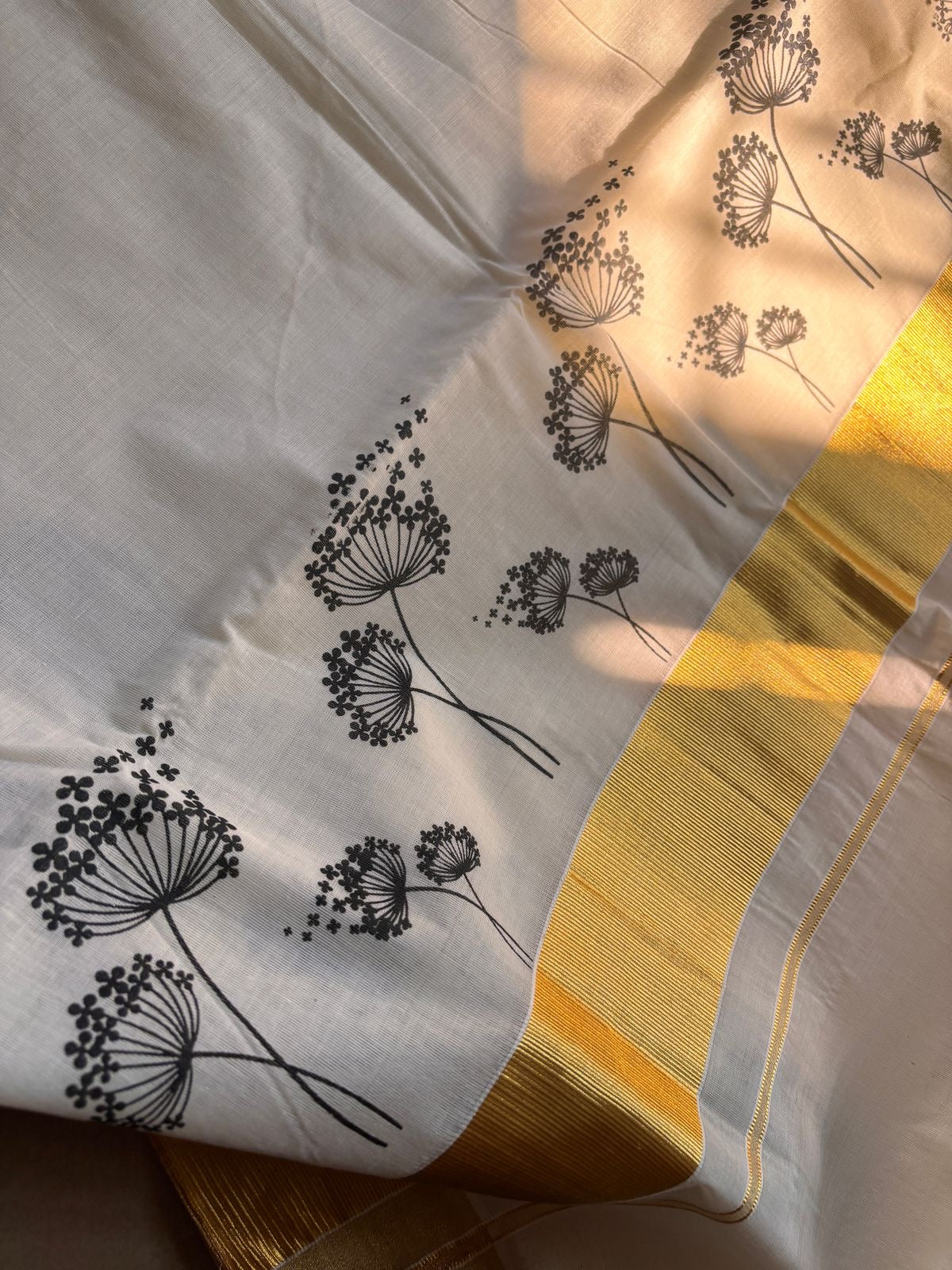 Sarvani Pure cotton breezy black mul flower in golden Kasavu Kerala Set saree SAR08