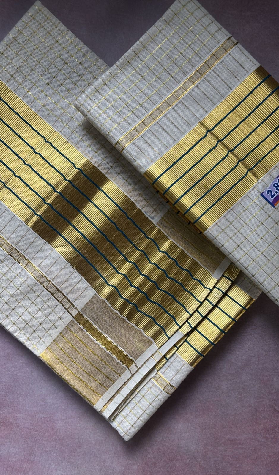 Sarvani Golden Tissue zari checks kasavu with blue kara Set Mundu