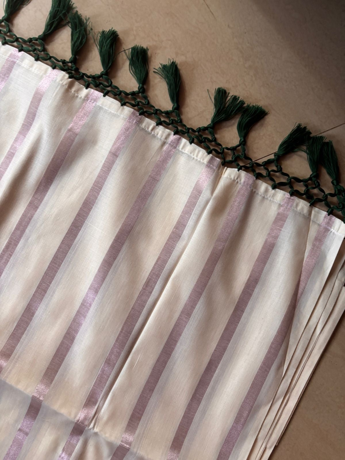 Sarvani Rose gold stripes Kerala Saree with bottle green tassels SAR12