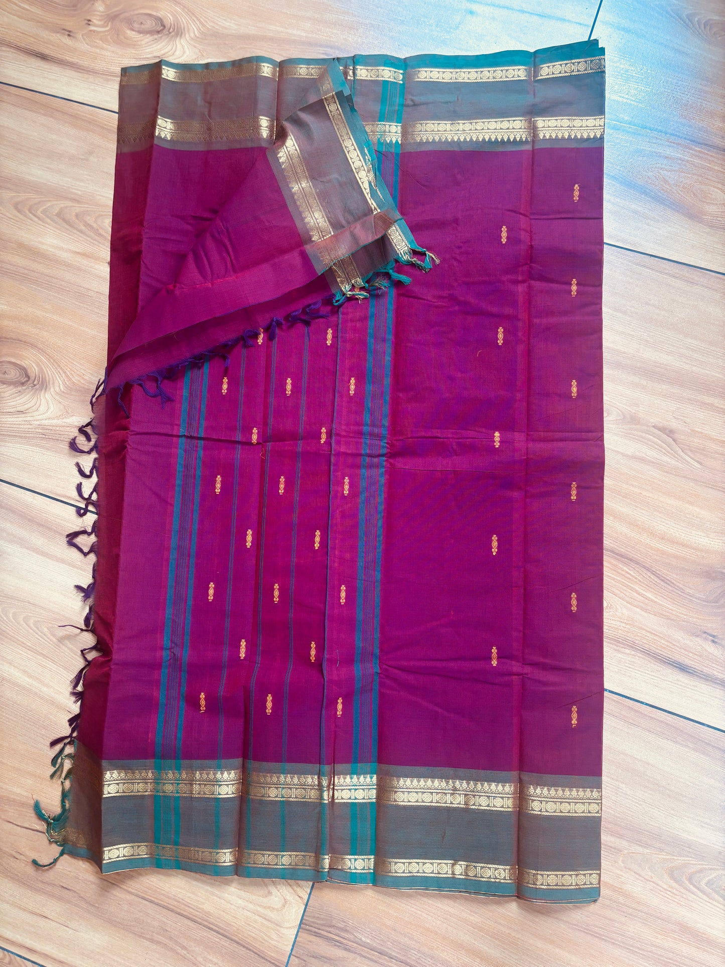 Vintage maroon Kanchi cotton saree with contrast border and buttas