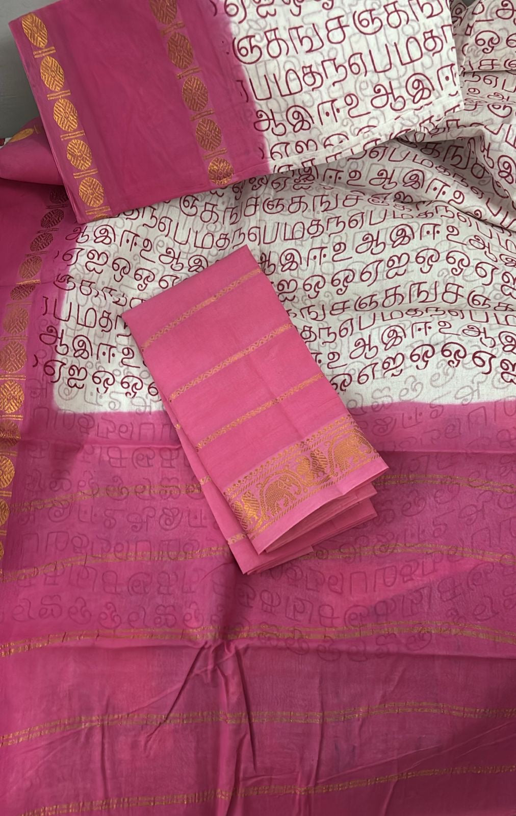 Tarangini Tamil letters with rudraksha border Sungudi Cotton Saree in powder pink shade