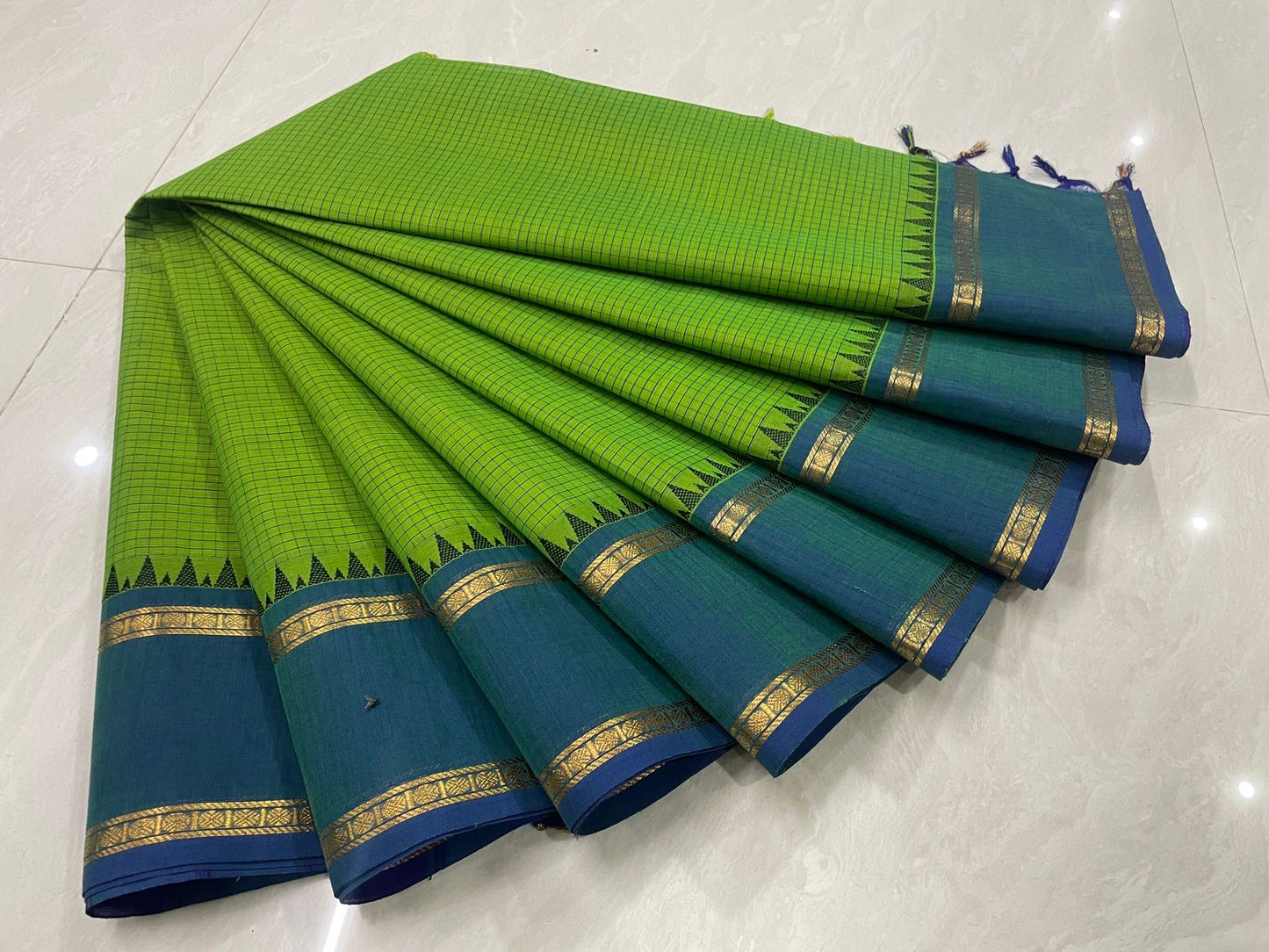 Sangita vintage korvai checks green saree with contrast border Shwetha Menon’s choice