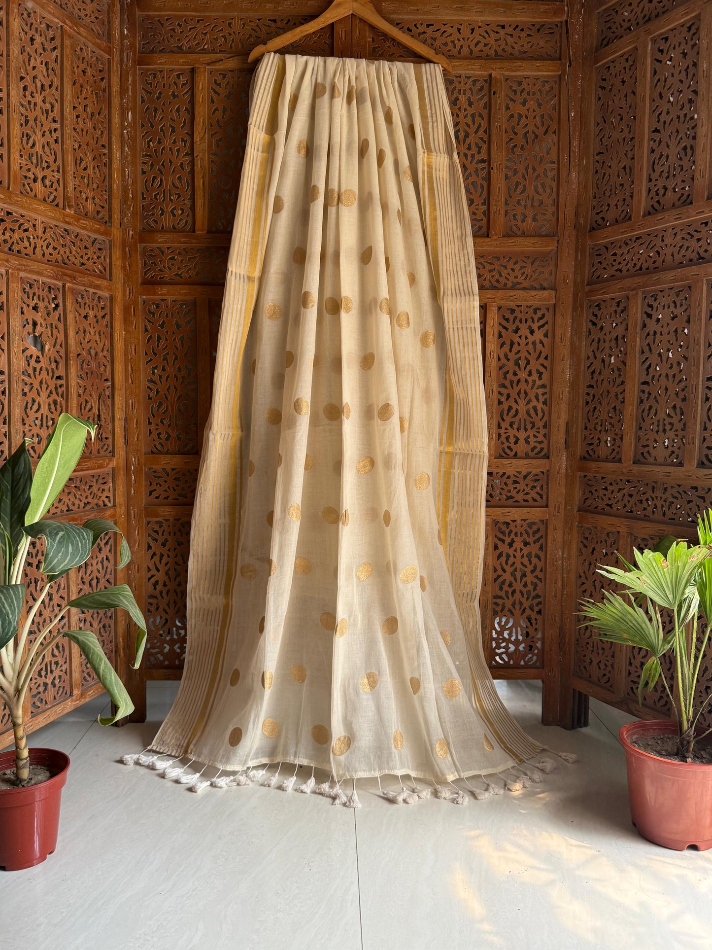 Golden polka handloom Mul Mul Saree Festive edit