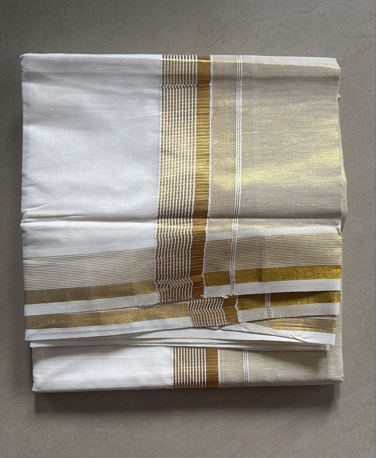 Half tissue half cotton border gents double Mundu Onam special