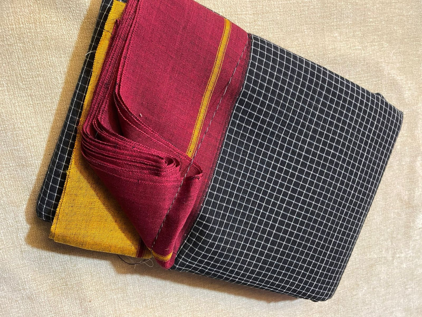 Patteda Aanchu handloom marked Sarees Black checks with orange and maroon border