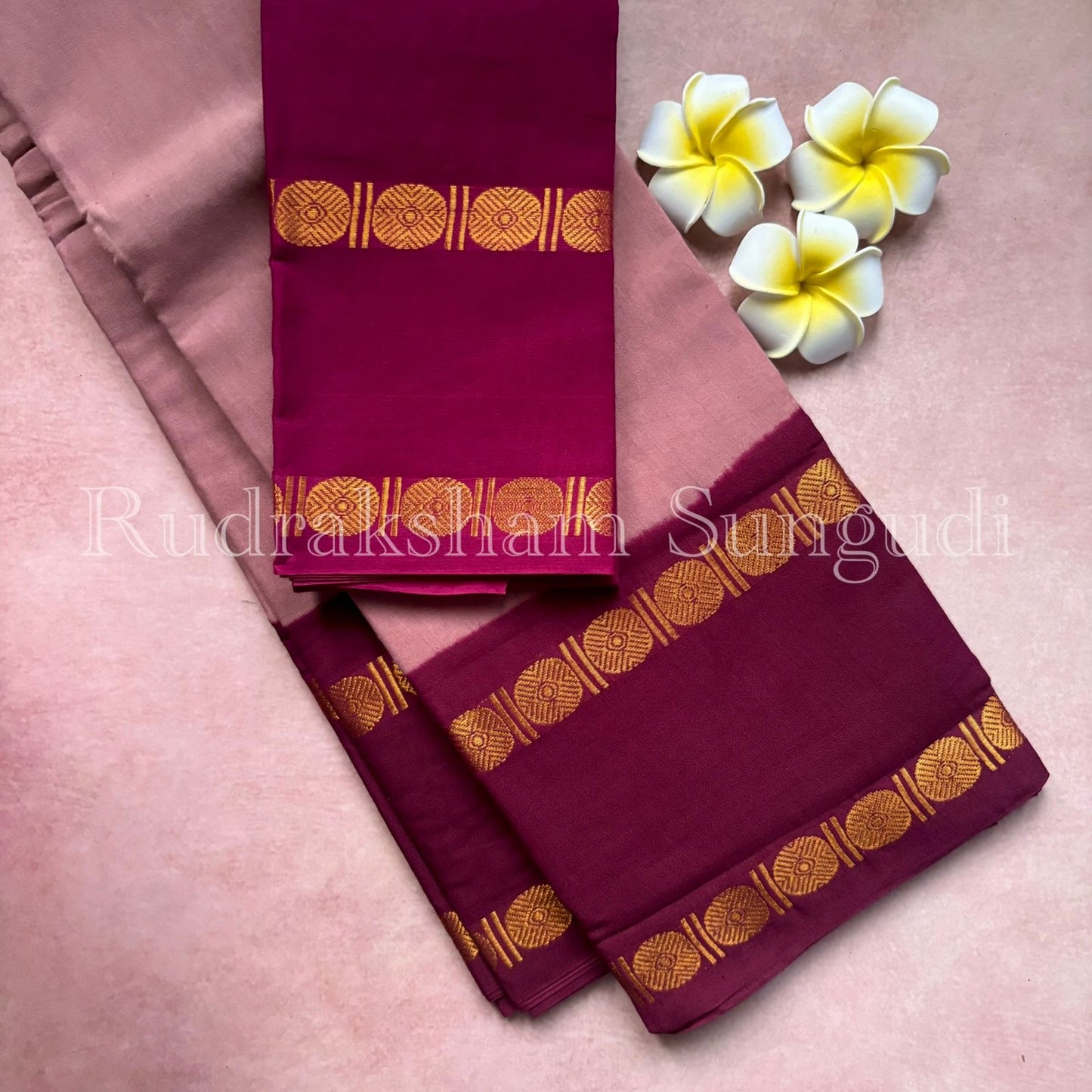 Rudraksha border sungudi cotton saree with contrast maroon blouse