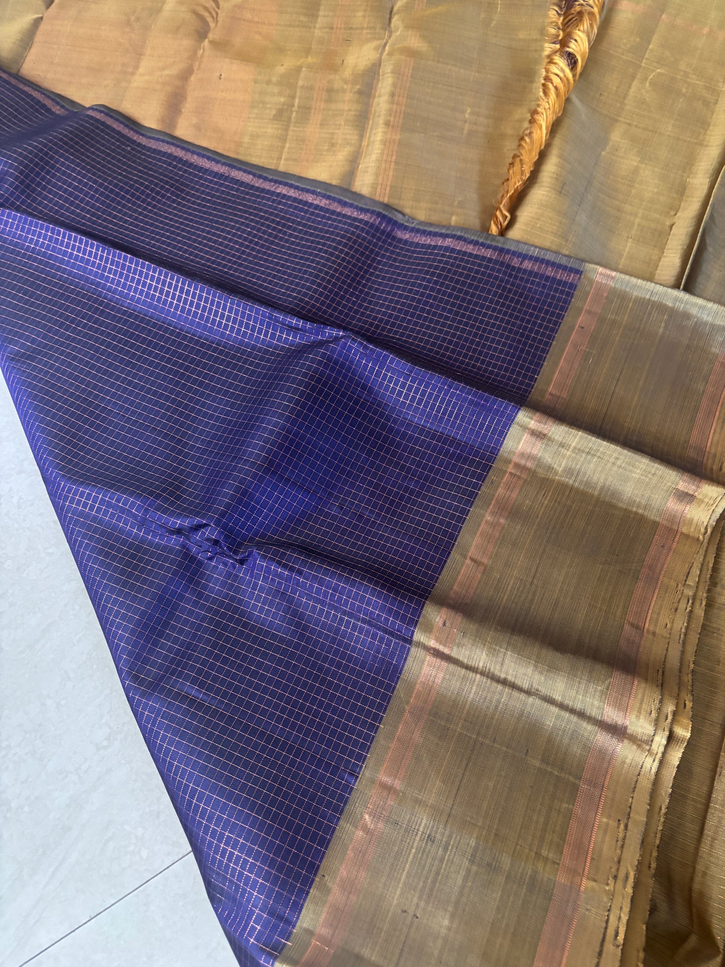 Kanjipuram Silk Saree in deep purple with contrast golden brown border