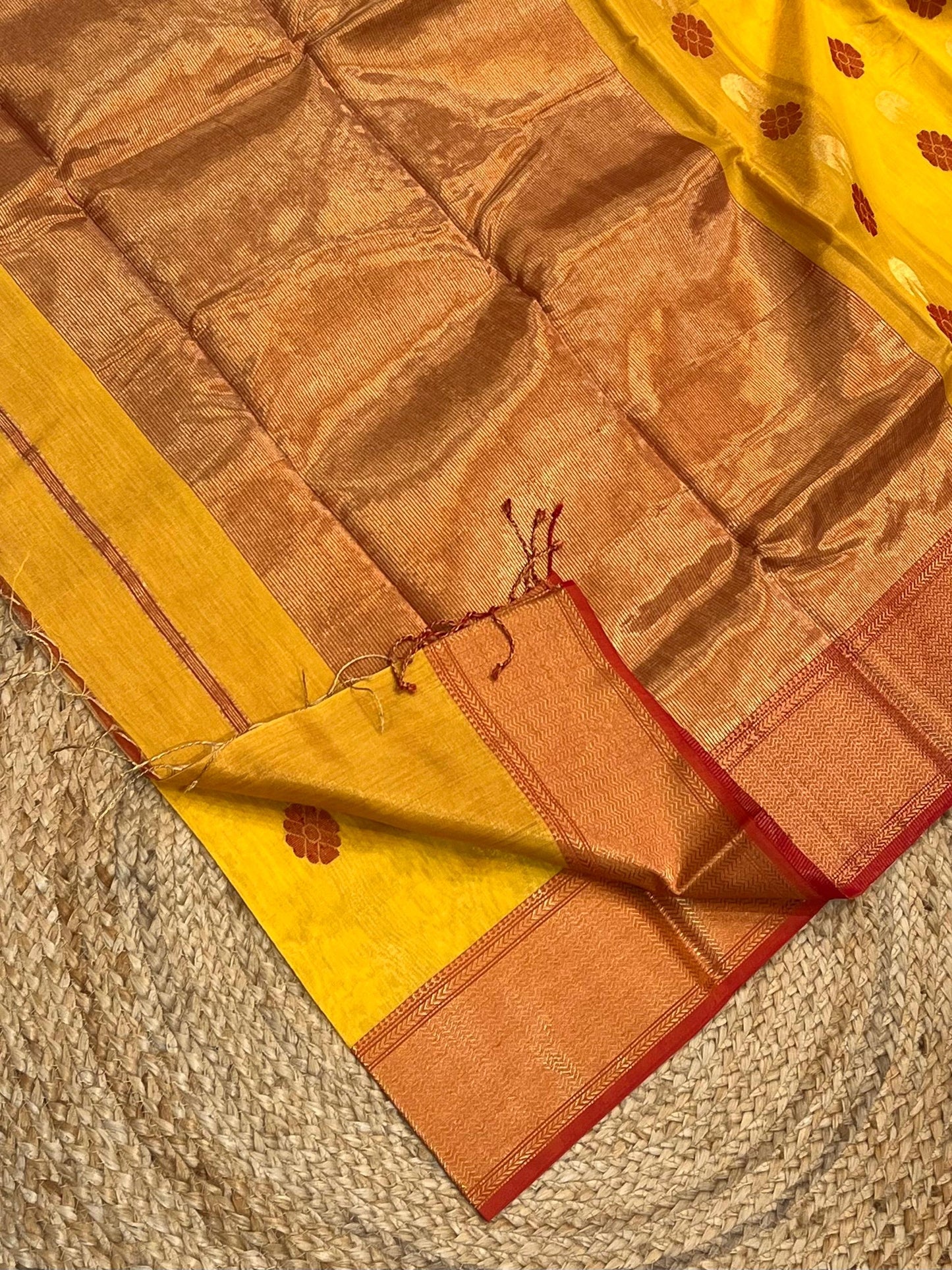 Festive yellow Maheshwari handloom tissue floral butta Saree