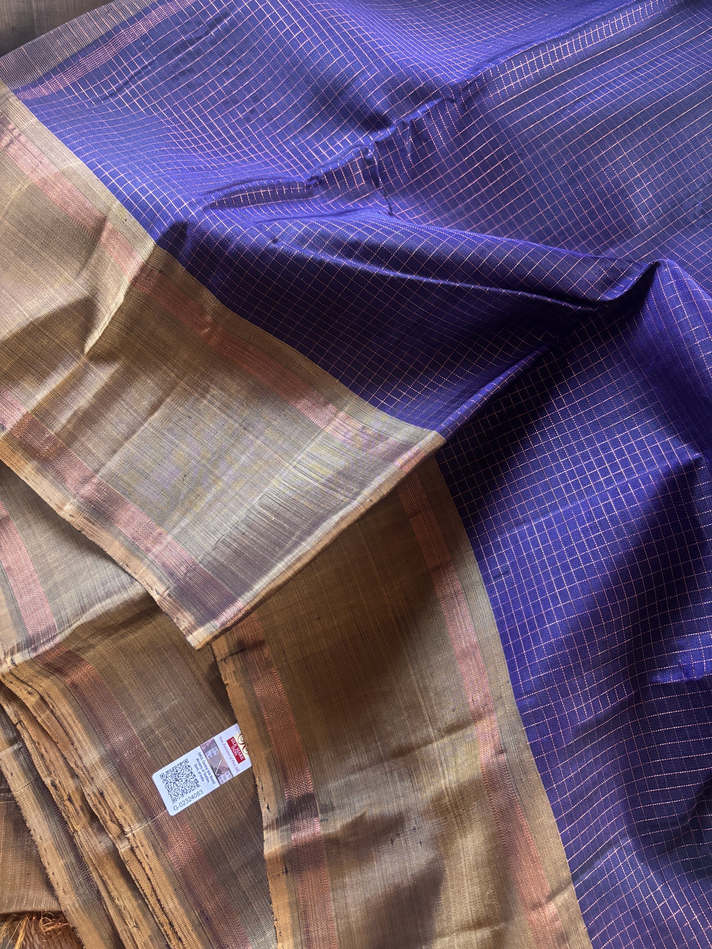 Kanjipuram Silk Saree in deep purple with contrast golden brown border