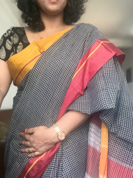 Patteda Aanchu handloom marked Sarees Black checks with orange and maroon border