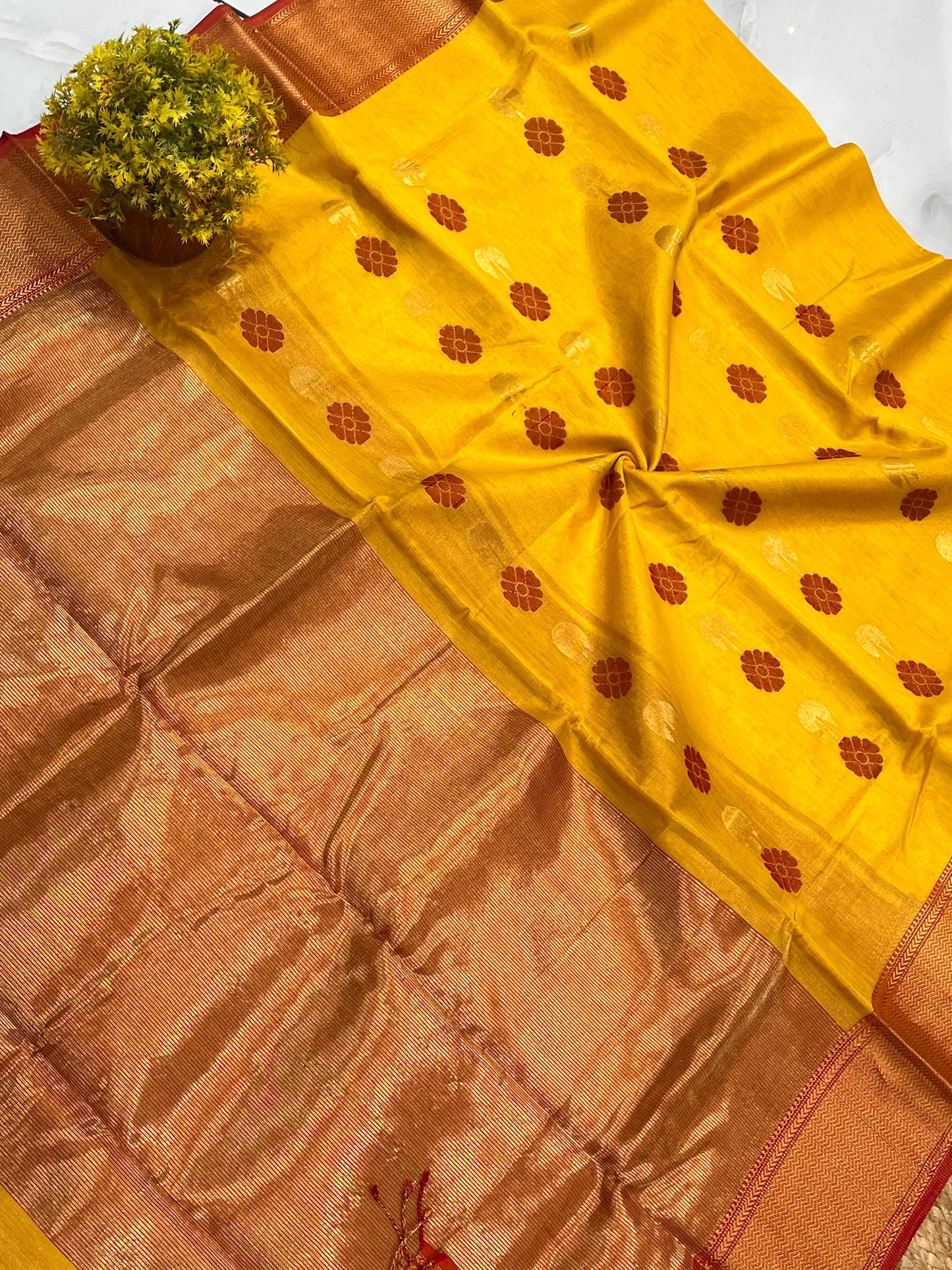 Festive yellow Maheshwari handloom tissue floral butta Saree