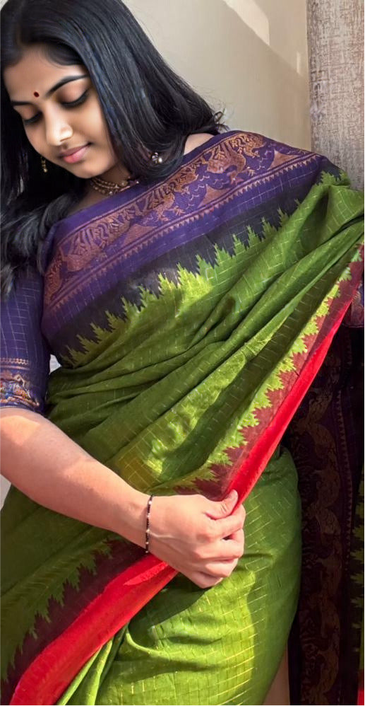 Green body Ganga Jamuna Sungudi Saree with violet and red temple borders