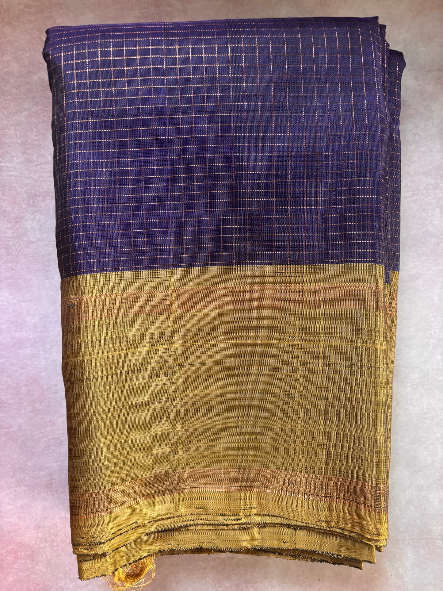 Kanjipuram Silk Saree in deep purple with contrast golden brown border