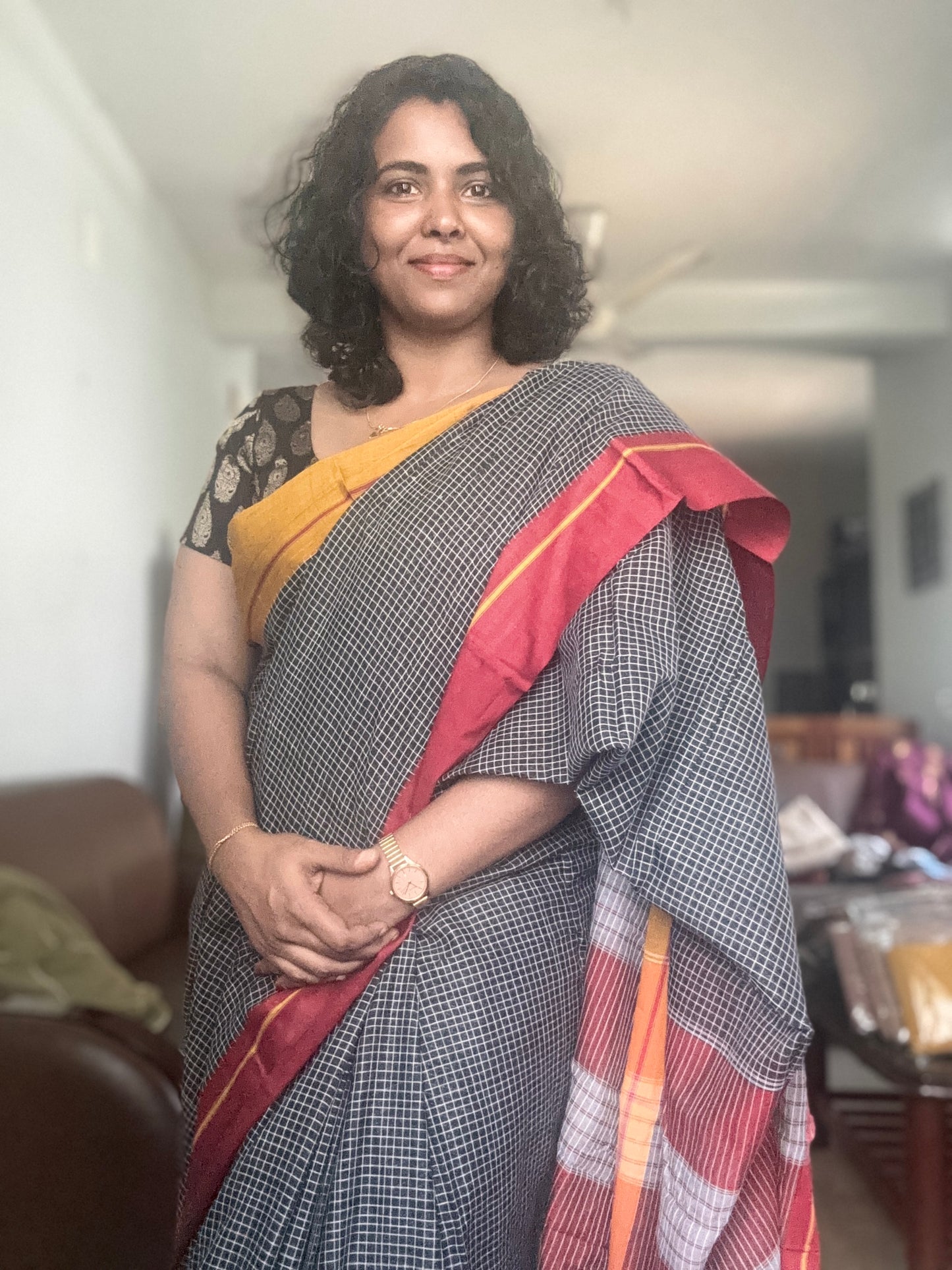 Patteda Aanchu handloom marked Sarees Black checks with orange and maroon border