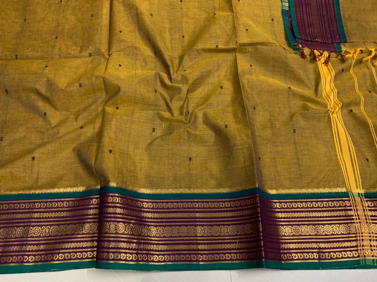 Sangita kanchi cotton saree mustard yellow with contrast border and buttas