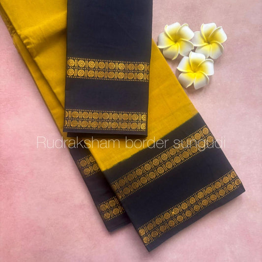 Tarangini Rudraksha border Mustard yellow with black border cotton saree