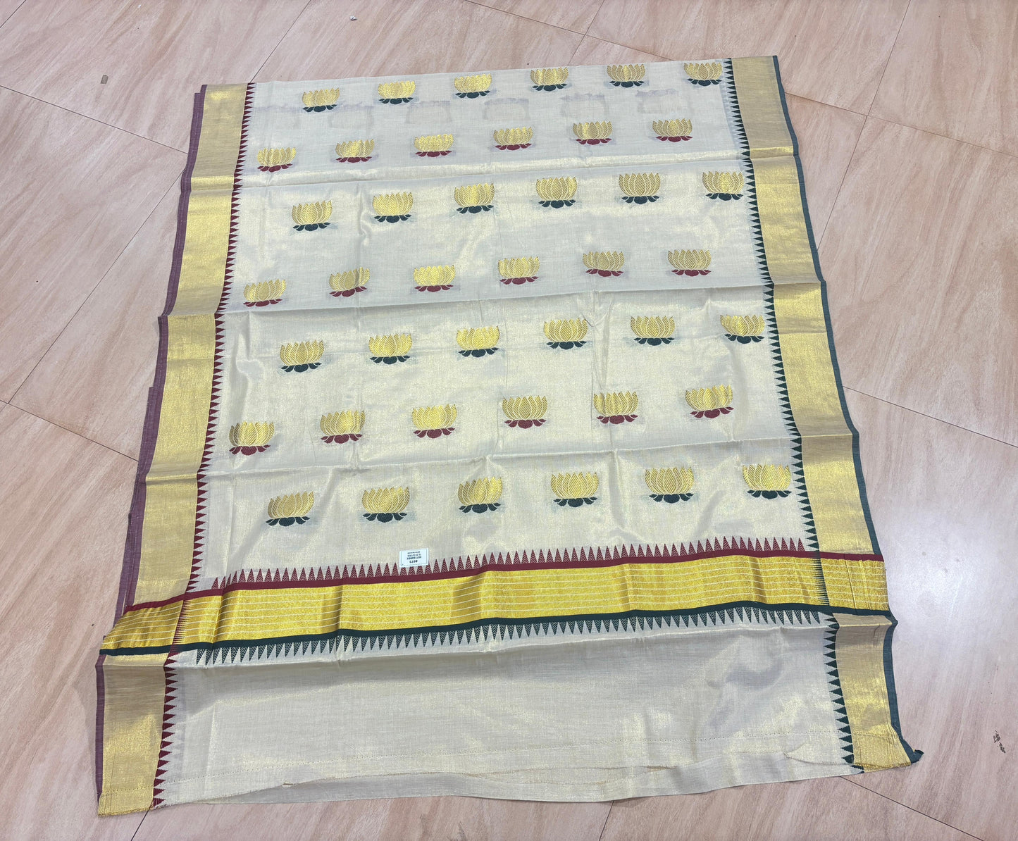 Golden tissue multi colour lotus motif Saree