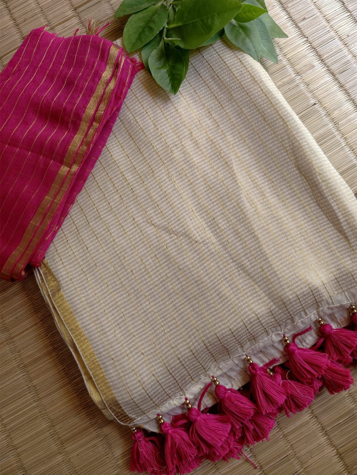 Onam edit white zari check mul saree with pink blouse