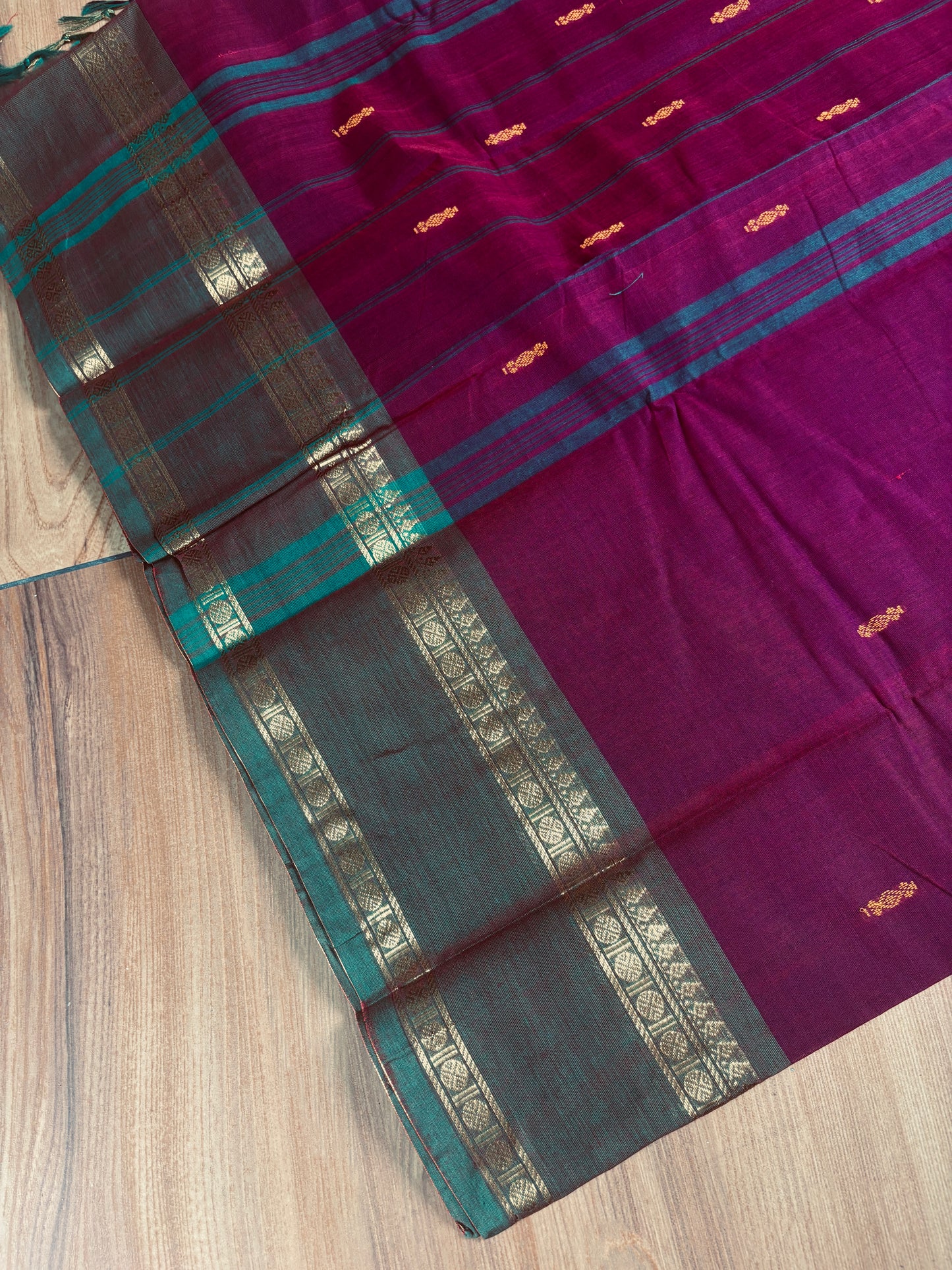 Vintage maroon Kanchi cotton saree with contrast border and buttas