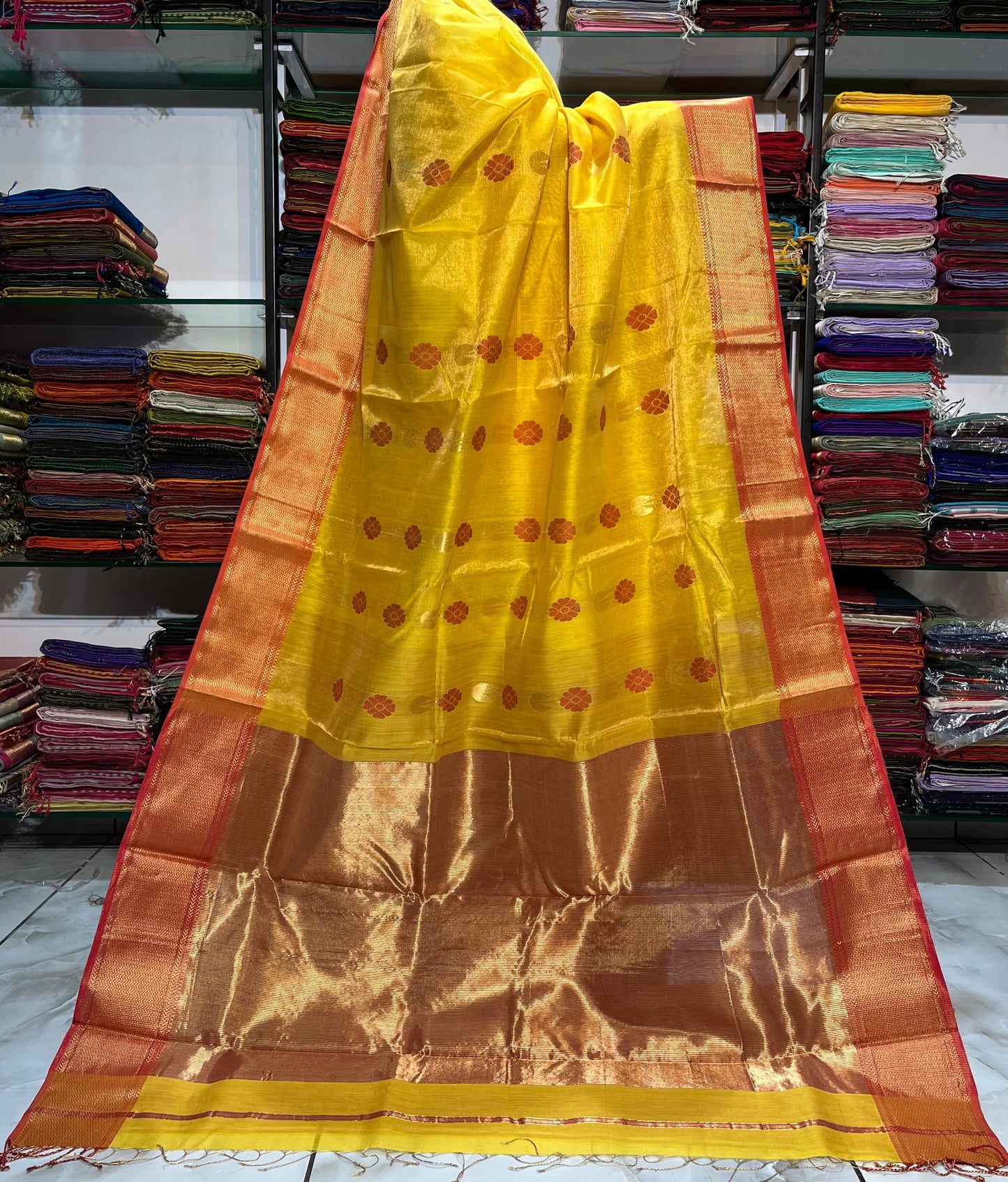 Festive yellow Maheshwari handloom tissue floral butta Saree