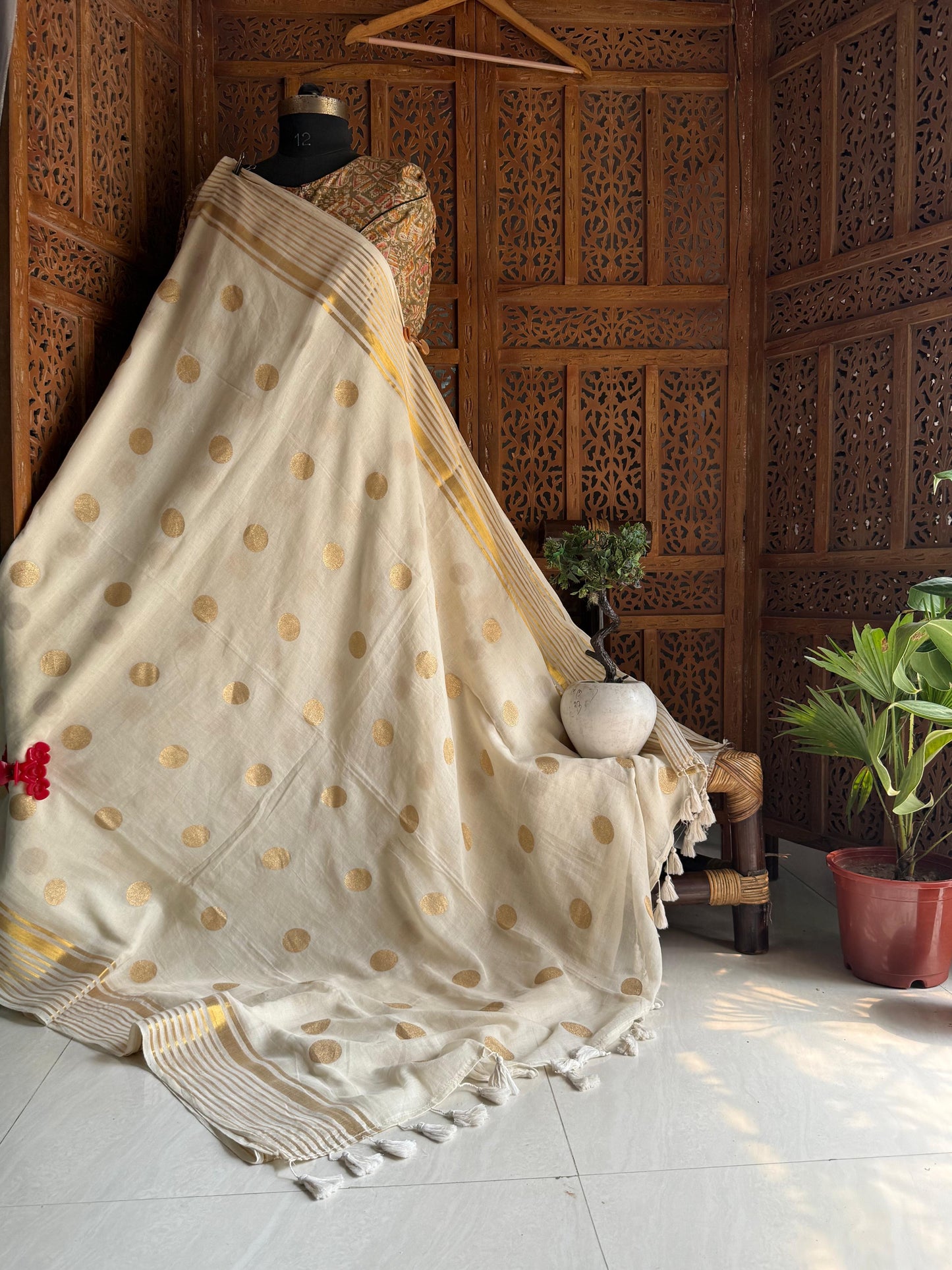 Golden polka handloom Mul Mul Saree Festive edit