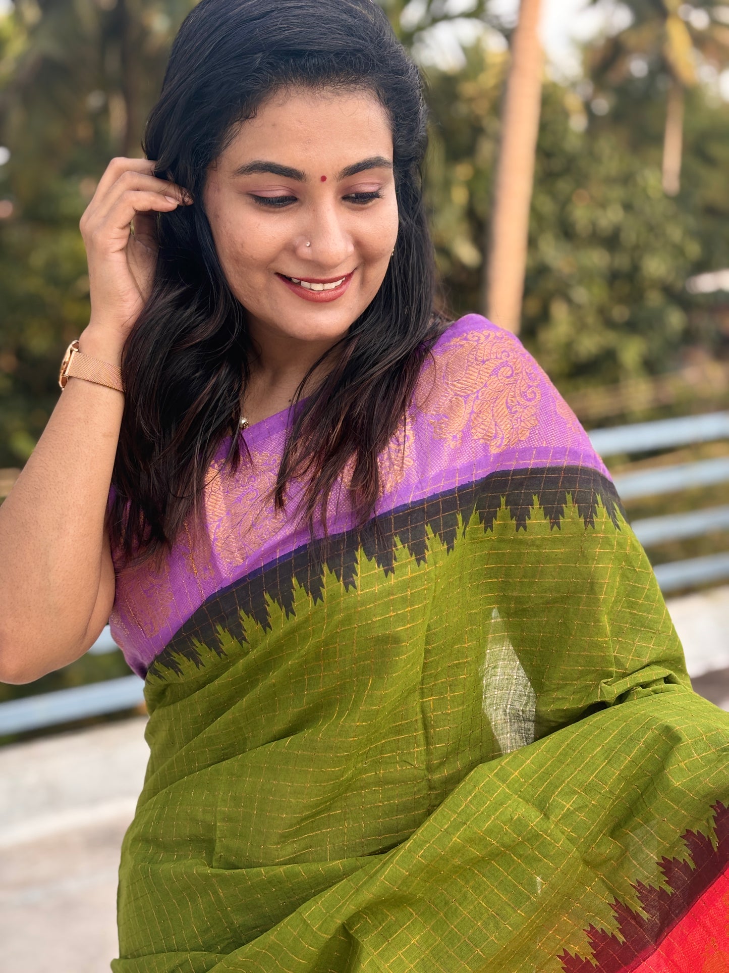 Green body Ganga Jamuna Sungudi Saree with violet and red temple borders
