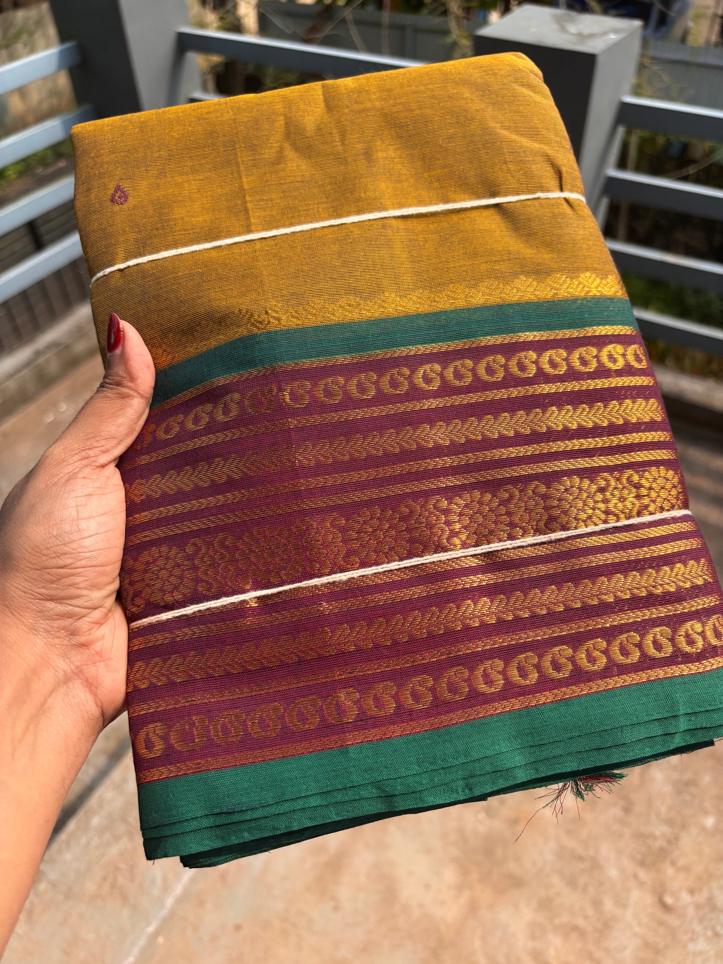 Sangita kanchi cotton saree mustard yellow with contrast border and buttas