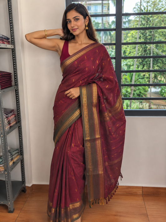 Vintage maroon Kanchi cotton saree with contrast border and buttas
