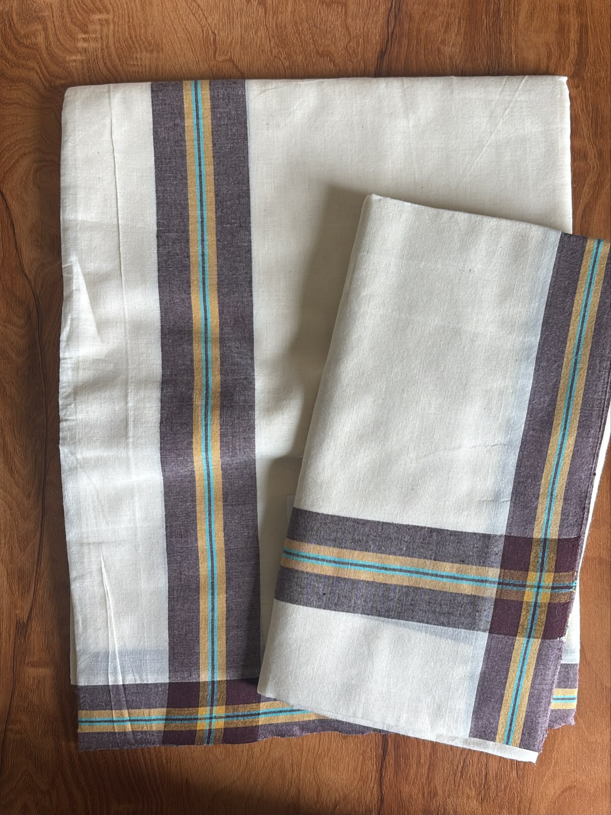 Mulloth daily wear pure cotton set Mundu brown with yellow blue stripes border