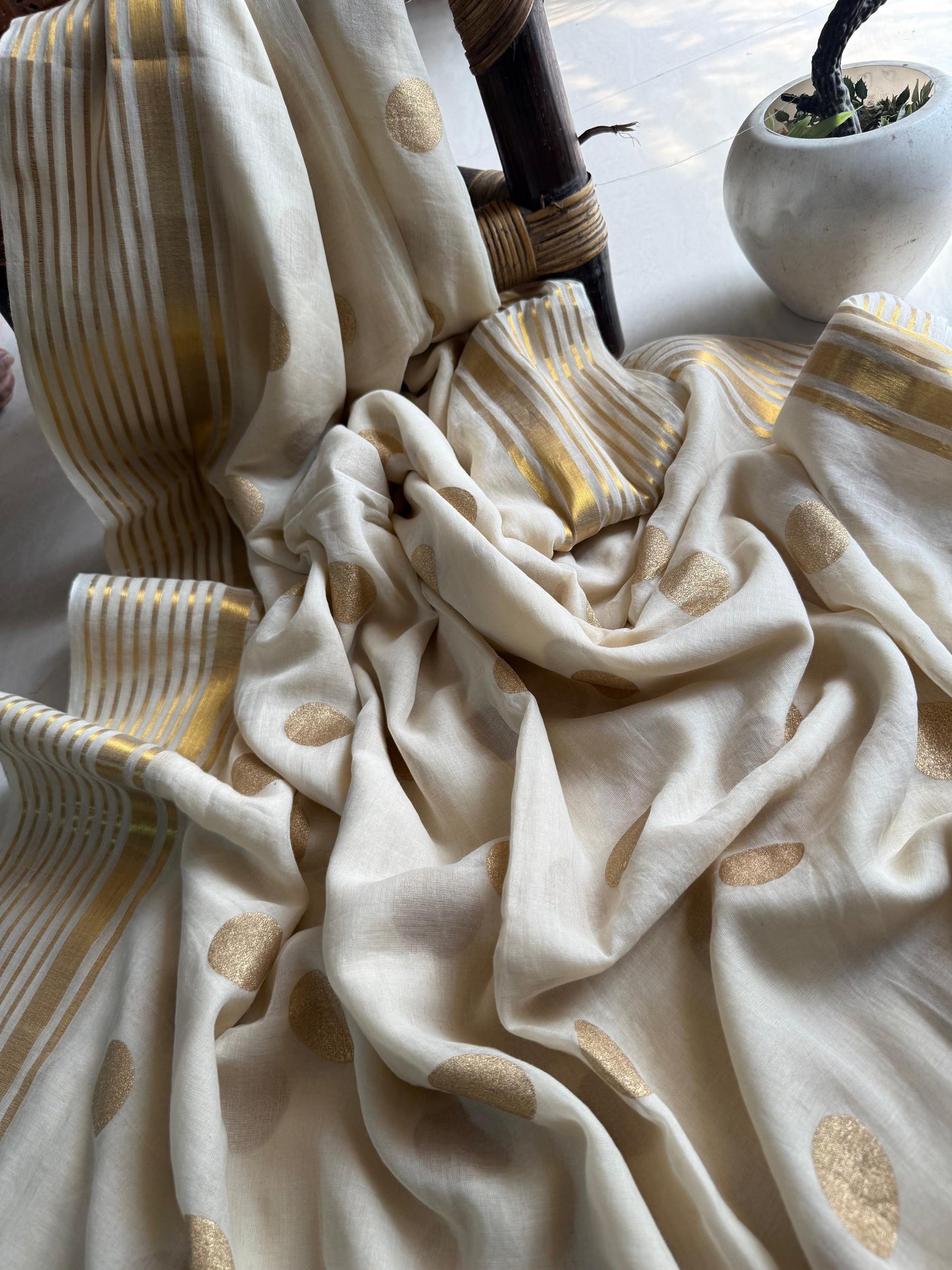 Golden polka handloom Mul Mul Saree Festive edit