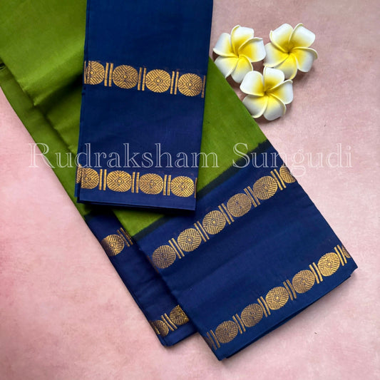 Rudraksha border green sungudi cotton saree with contrast blue blouse