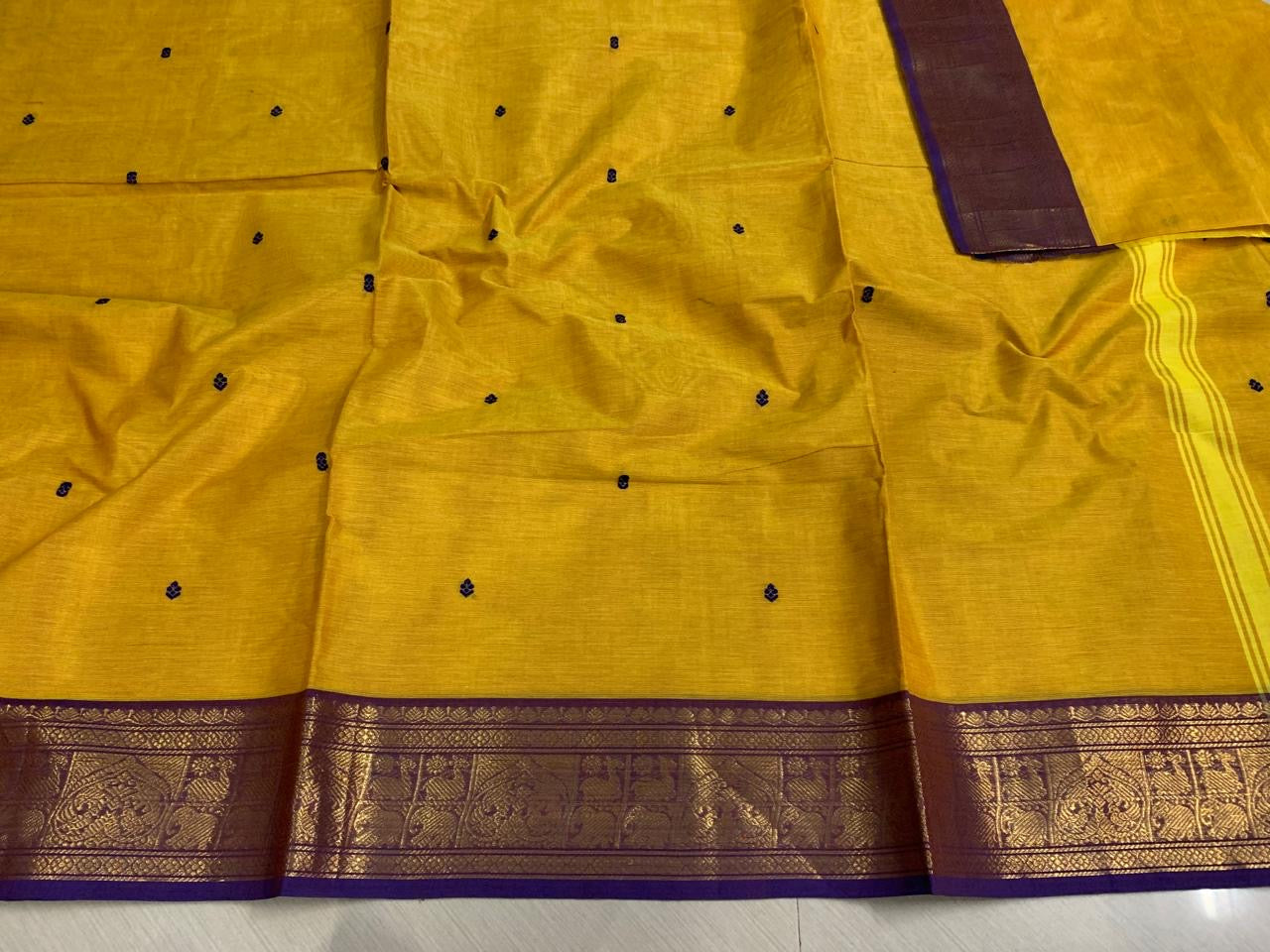 Kanchi cotton saree with contrast border and buttas